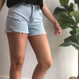 High-Waisted light blue ripped jean shorts